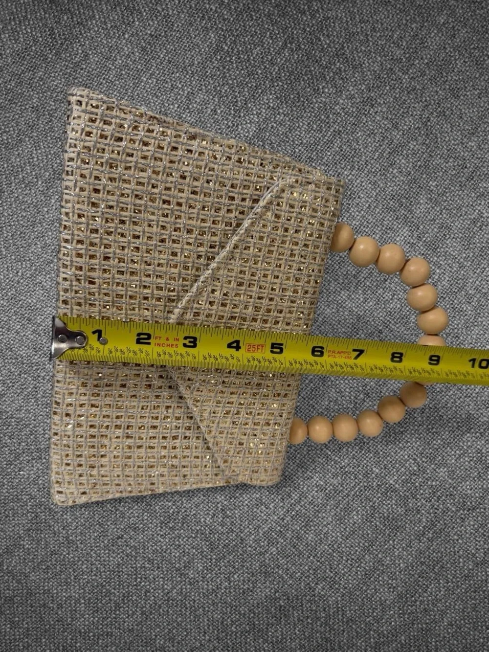 Metallic Gold Woven Envelope Handbag With Wooden Bead Handle And Chain Strap